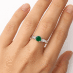 Twisted emerald ring with diamonds UAE