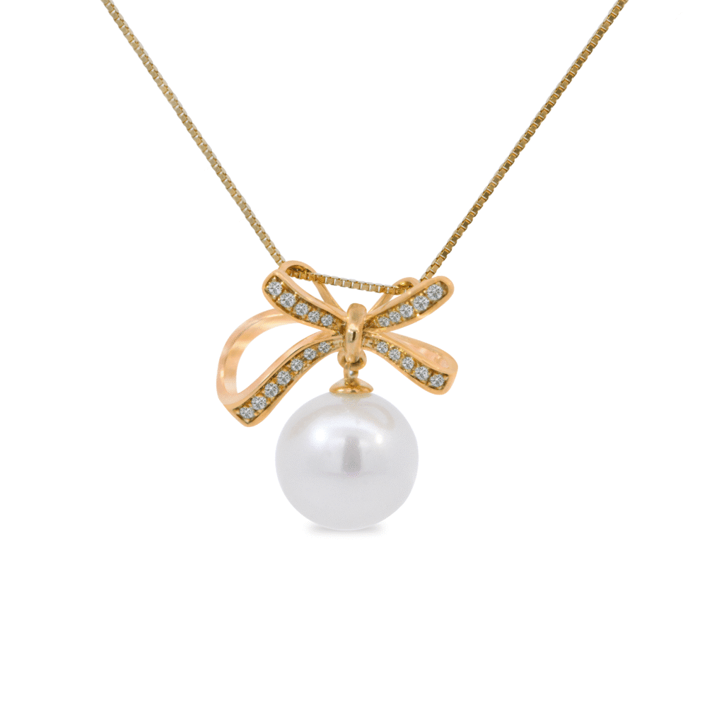 Bow pearl pendant with diamonds