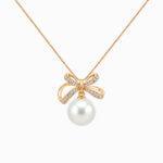 Bow pearl pendant with diamonds