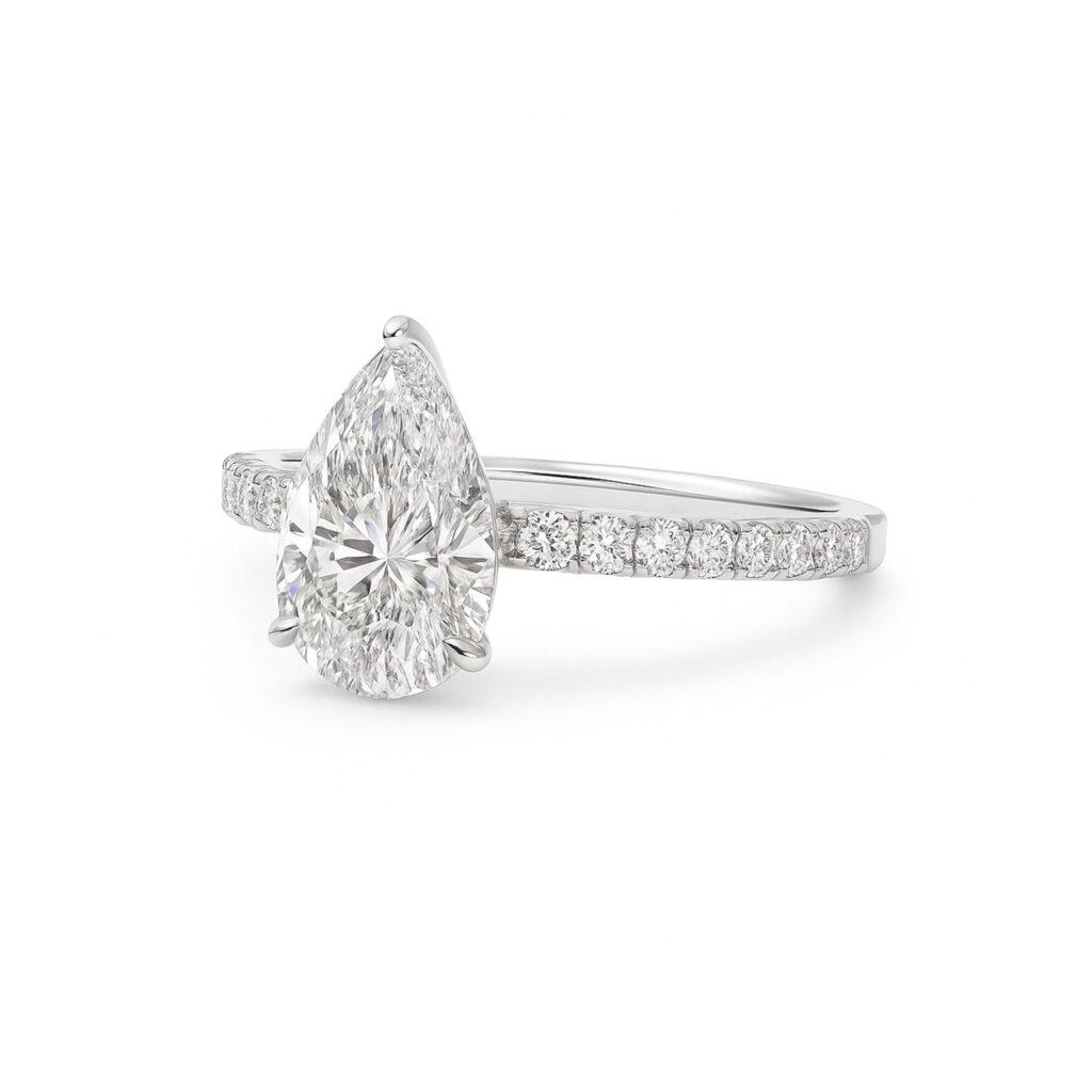 Pear diamond ring with Shoulder diamonds Dubai