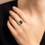 Emerald and Cadillac diamond Ring hand