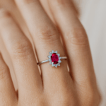 Oval Ruby Halo Diamond Ring Hand