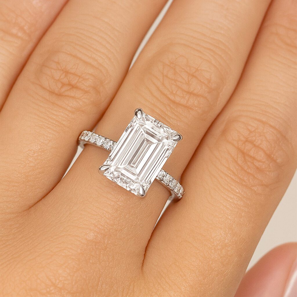 Emerald diamond ring with Shoulder diamonds UAE