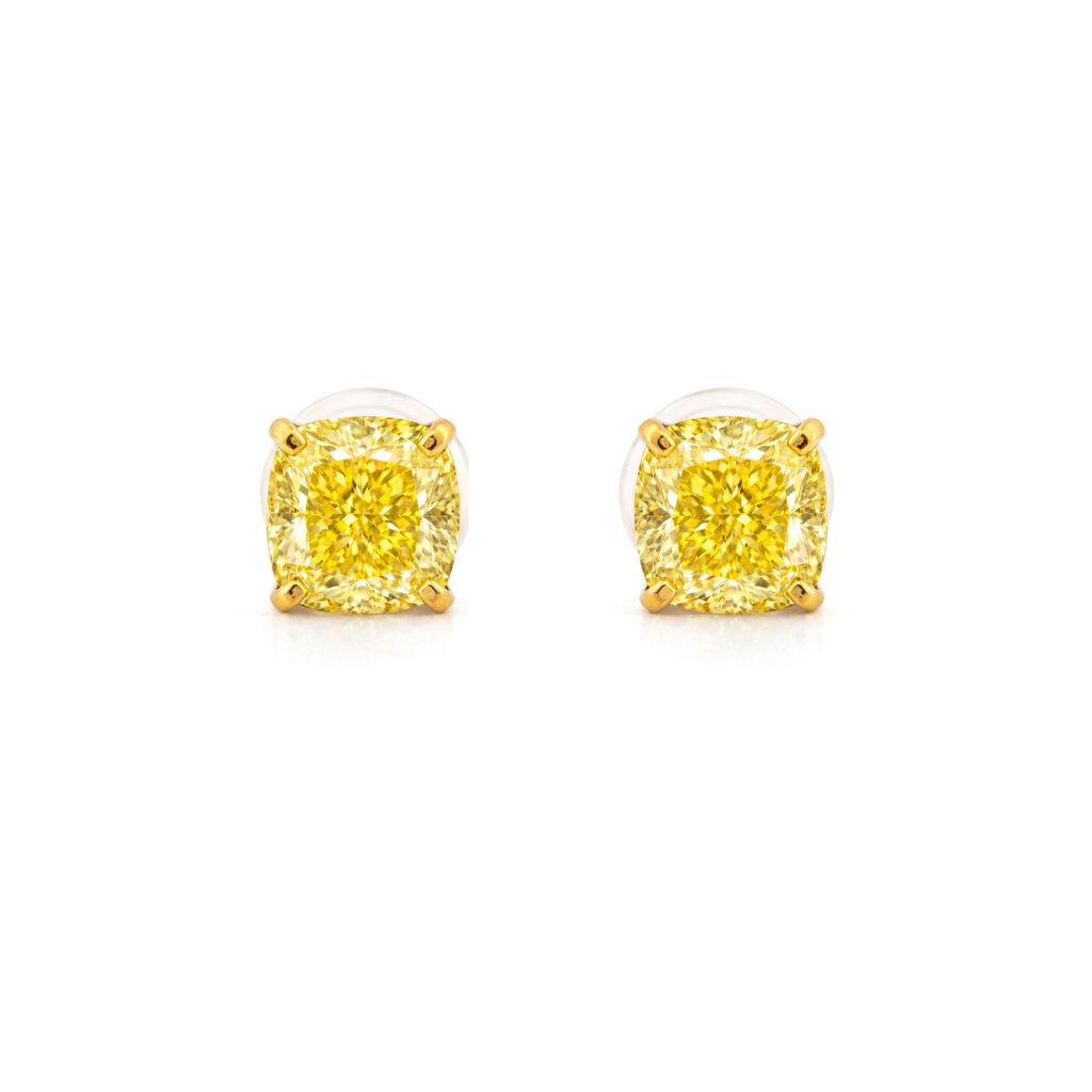 Cushion cut yellow diamond studs