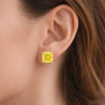 Cushion cut yellow diamond studs Dubai