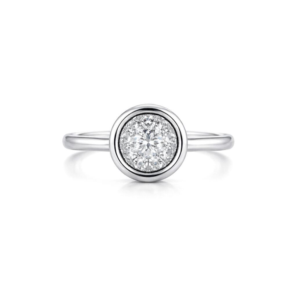 Halo diamond ring in bezel setting