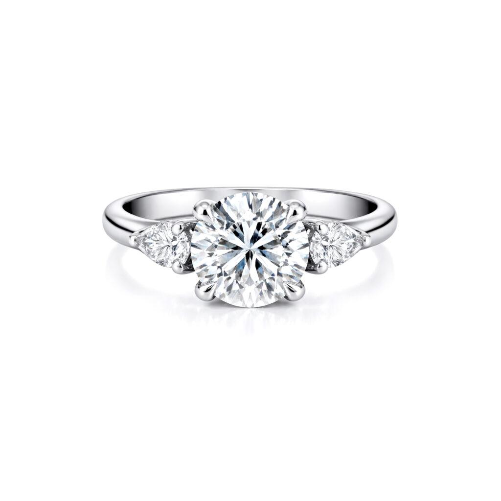 Round and Pear diamond Trilogy Ring