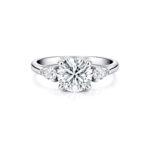 Round and Pear diamond Trilogy Ring