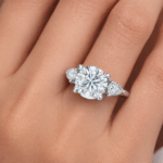Round and Pear diamond Trilogy Ring Dubai