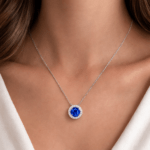 Sapphire necklace with diamond halo