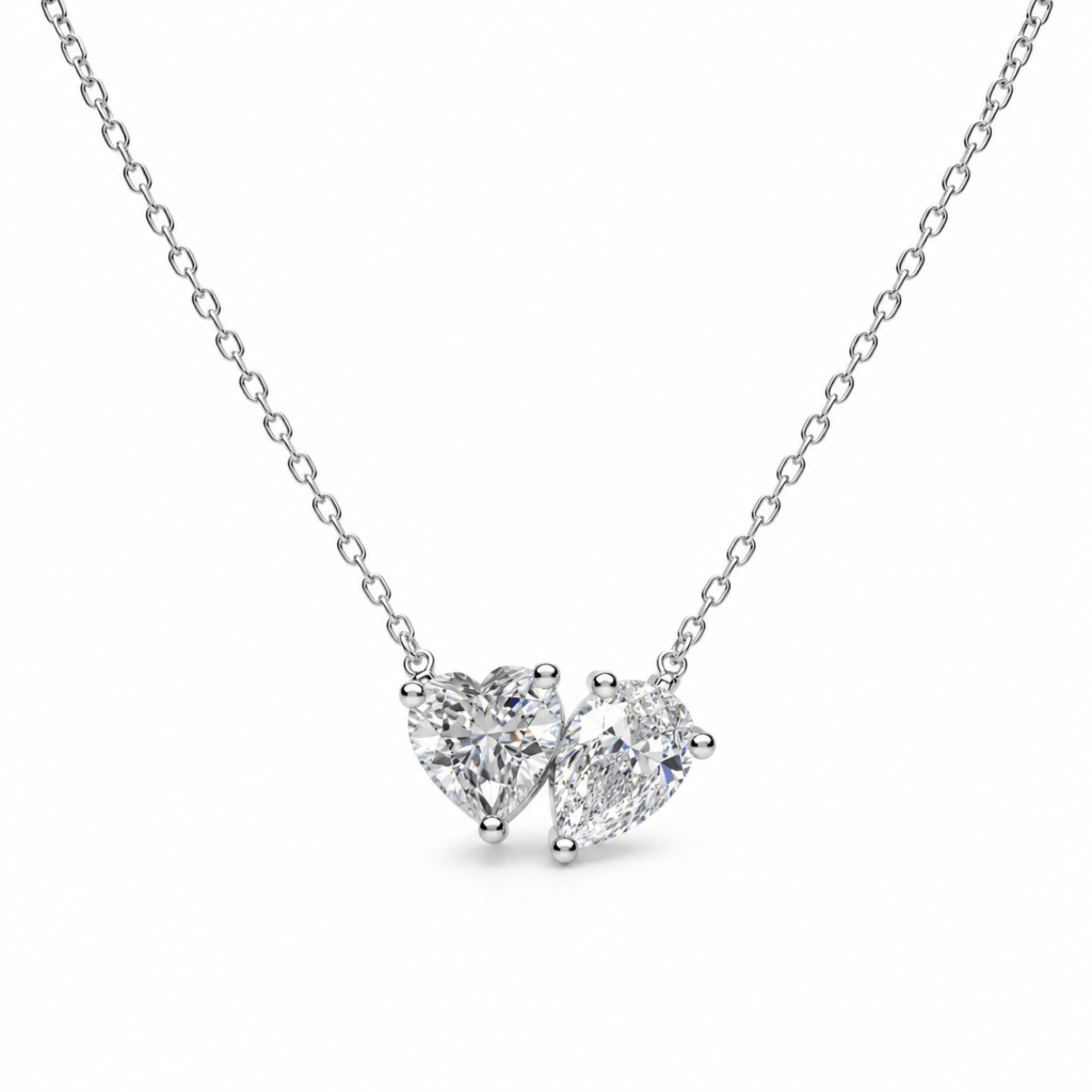 Heart and pear diamond pendant
