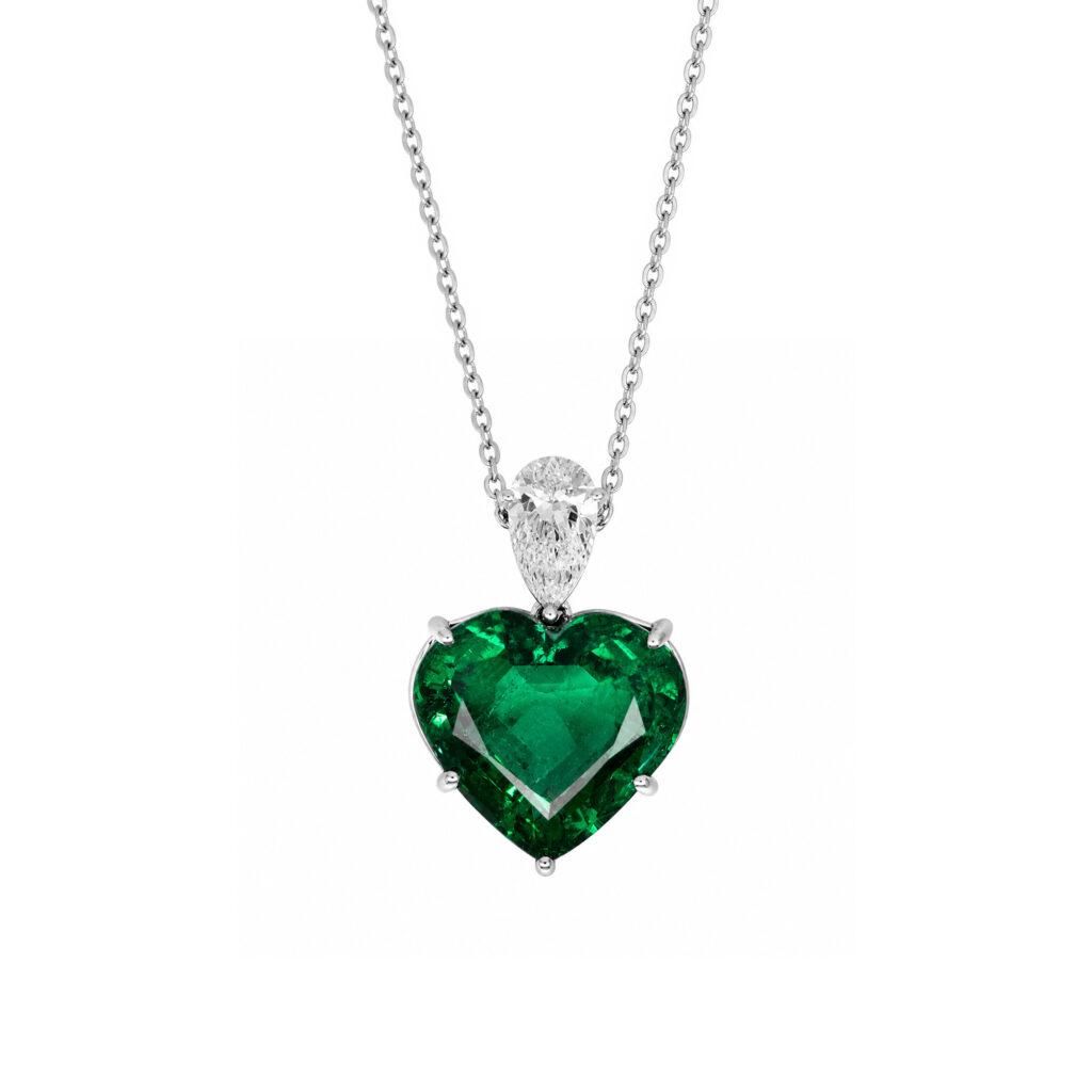 Heart shaped emerald pendant with diamond