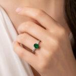 Oval emerald ring with shoulder diamonds Dubai