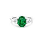 Oval emerald ring with side diamonds