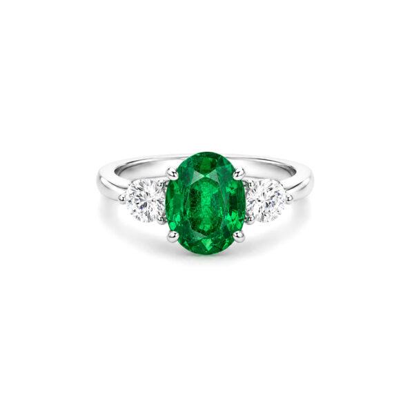 Oval emerald ring with side diamonds