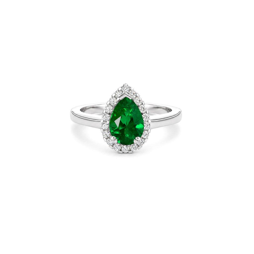 Pear shaped green emerald ring with halo