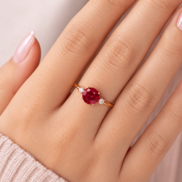Round shaped ruby ring with side diamonds Dubai